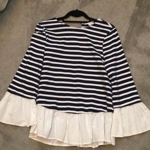 Never worn. Navy blue and white striped shirt.